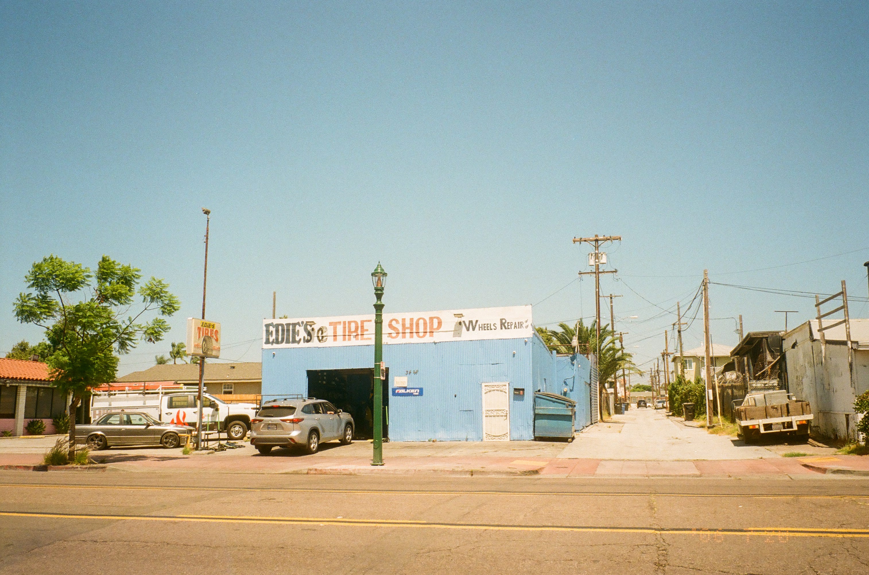Edie's Tire Shop owners Carlos and Edie providing friendly, expert auto repair service in San Diego, CA